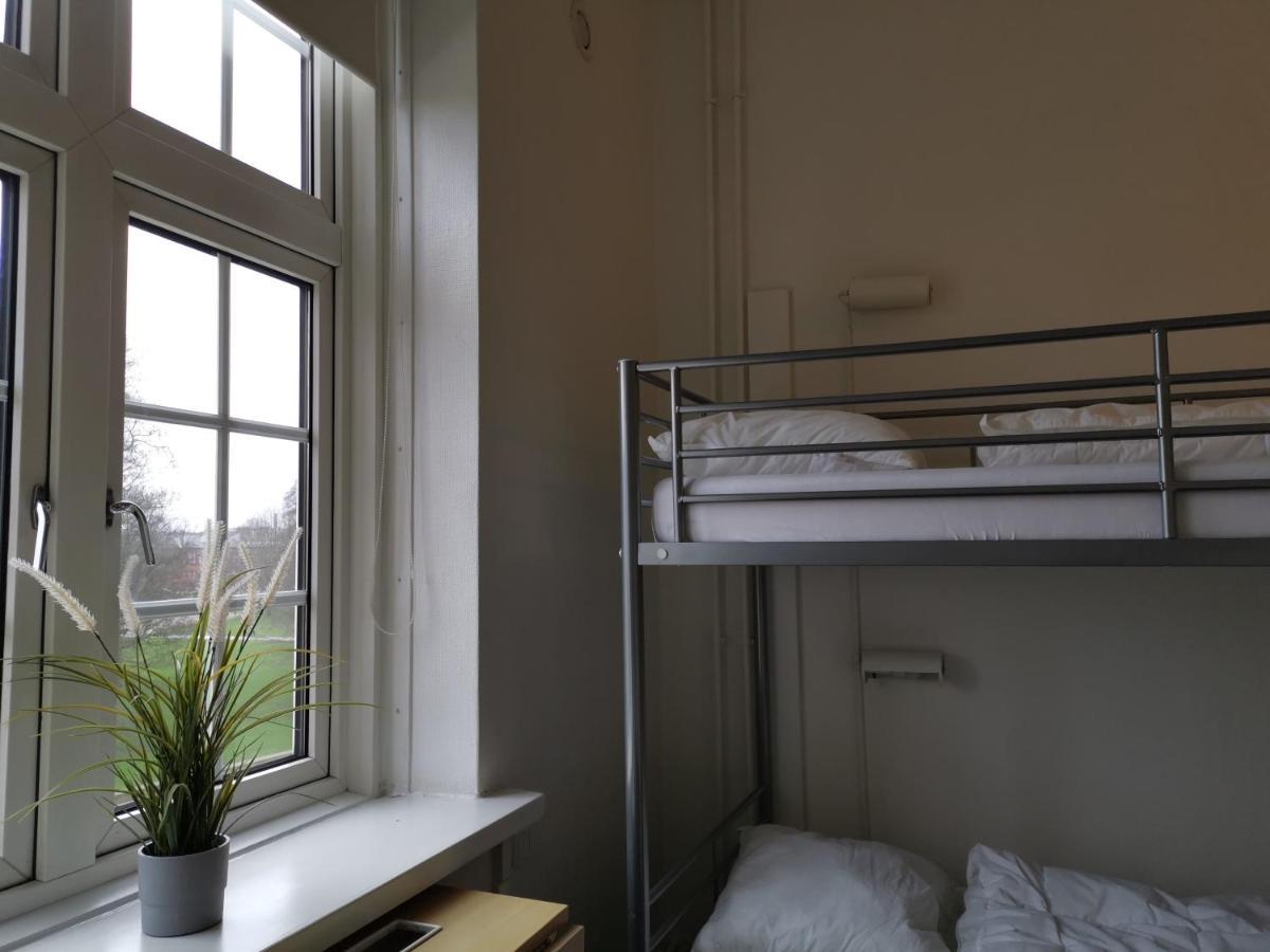 Danhostel Odense City Exterior foto A room at the hostel